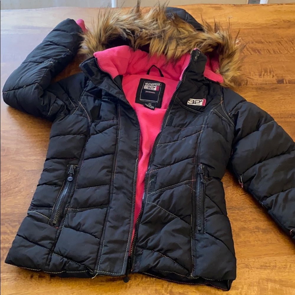 Weatherproof performance jacket for girl size 7/8